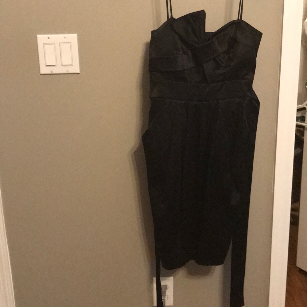 Black cocktail dress with pockets